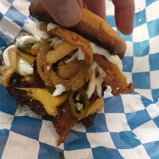 Mary Poppins smash burger with cheese, bacon, jalapenos, fried onion, and mayo. Fantastic!