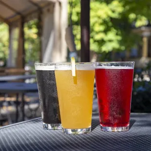 12 local beers, ciders and kombucha on tap. Outdoor seating in our covered courtyard or parking plaza.