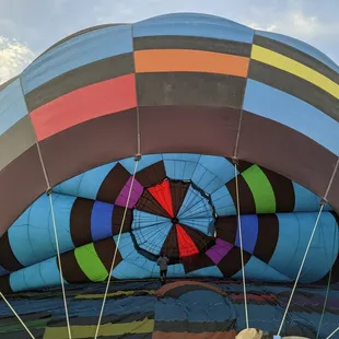Capt. Nick inspecting his balloon (Morning Splendor) from the inside prior to takeoff.