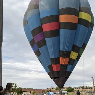 Morning Splendor has landed...the crew prepares to bring her down and pack her up for the ride home.