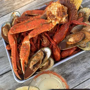 Snow crab legs, crawfish, mussels, corn, sausage - with hot butter