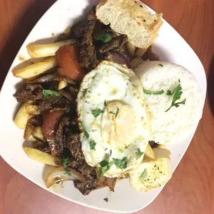 Lomo saltado with fried egg. Totally homemade taste