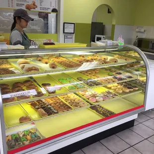 a woman behind the counter