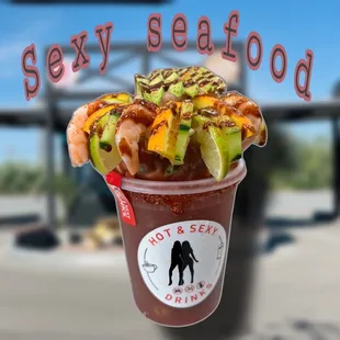 a cup of hot and sea food