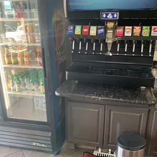 Self serve soda fountain and bottled drinks