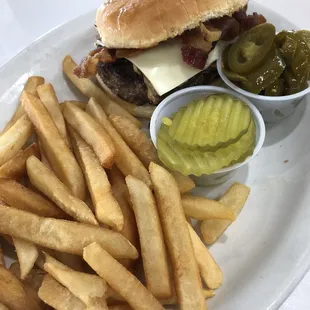 Bacon Cheeseburger with mustard, pickles, and jalapeños. Very delicious burger. Thick juicy patty. Fries were good but barely touched them.