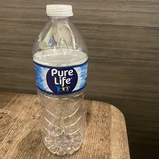 Water bottle i was charged for when i specifically asked for glass of water.