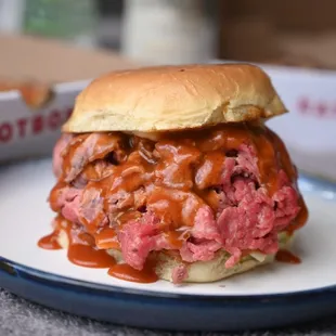 a beef sandwich on a plate