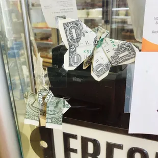 Hot breads- Hillcroft- thought this random $bill designs displayed at the cash counter is really cute