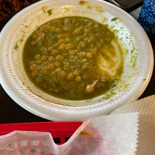 a bowl of soup and a spoon