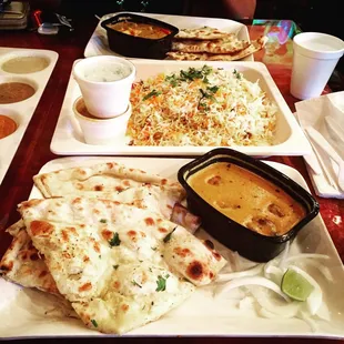 Malai kofta, veg dum biryani, and paneer tikka masala