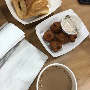 a cup of coffee and pastries