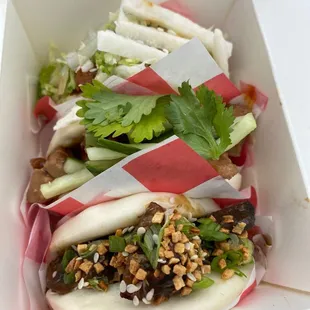 Pork, chicken, and beef bao.
