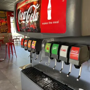 a coca cola machine in a restaurant