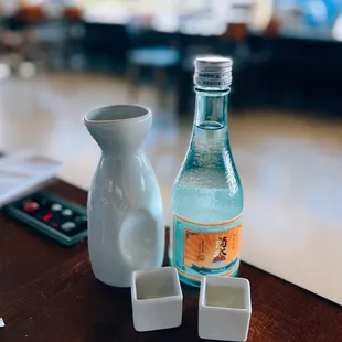 House sake / $6 + Kikusui junmai ginjo sake / $21 (but charged $6)