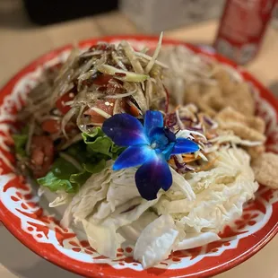 Papaya salad Laos style. I won&apos;t go anywhere else. The spice level is on point!!