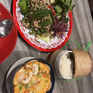 Larb Salad mince chicken, Tom Kha Soup veggie and a side of sticky rice.