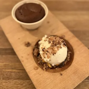  chocolate dessert and a small bowl of ice cream