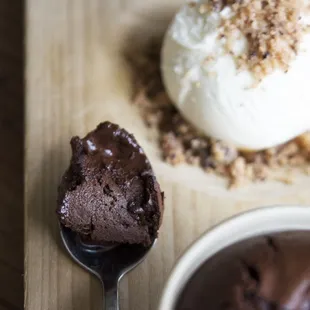 a spoon with ice cream and chocolate