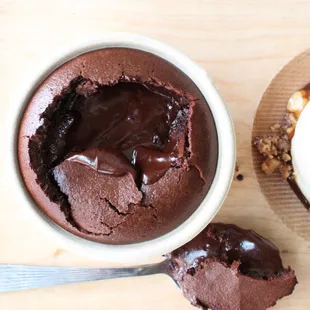 a cup of chocolate cake and a spoon