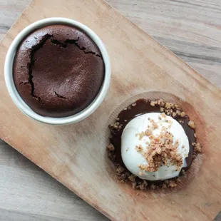 a chocolate cake and a cup of ice cream