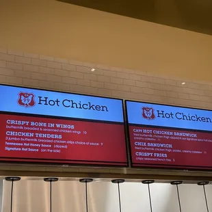 menus on the wall of a restaurant