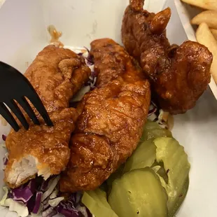 Disgustingly salty and over fried chicken strips. Had no reason to be on pickles from a can or lettuce etc