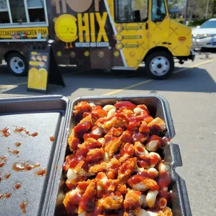 Twisted tots. Tater tots, mac and cheese, chicken, and BBQ sauce.