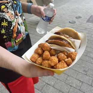 Chicken tacos with BBQ sauce and tater tots