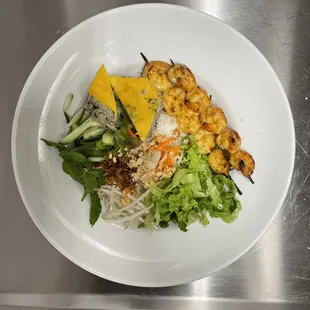 Vermicelli noodles with egg cake and char-broil shrimps.