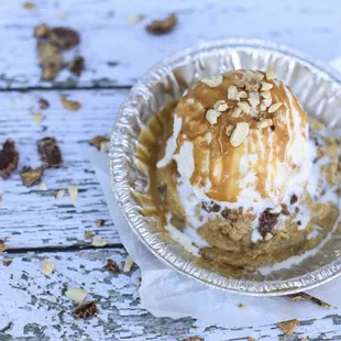 Tom boy- peanut butter cup cookie with vanilla bean ice cream, warm peanut butter sauce and peanuts