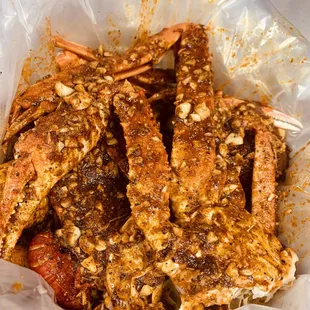 a close up of a basket of cooked crabs