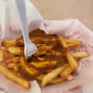 Chili cheese fries. Slice of cheese and some yummy chili.