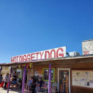 The entire little town is quiet except Hot Diggity Dog. This must be the place