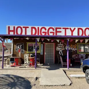 a truck parked in front of a store