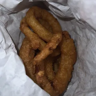 onion rings in a paper bag