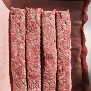 Ground chuck and sirloin blend. Fresh meat delivery every other day. Hand molded into quarter pound Burgerdogs.