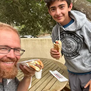Burger dog with the boy