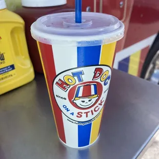a cup with a straw