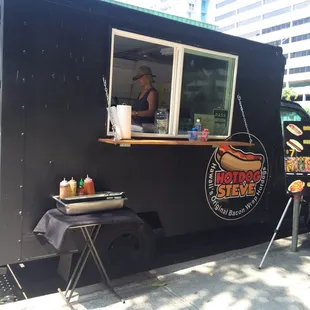 a food truck with hot dogs on it