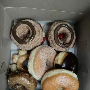 I asked for regular cronuts and she's dressed them up and charged me for what I didn't ask for! $14.00 dollars for 6 and got 1 free.