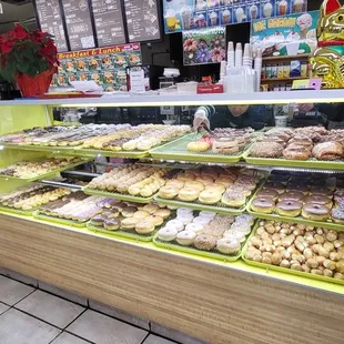 Selection of donuts and sandwiches + smoothies on menu