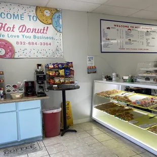 the front counter of a donut shop