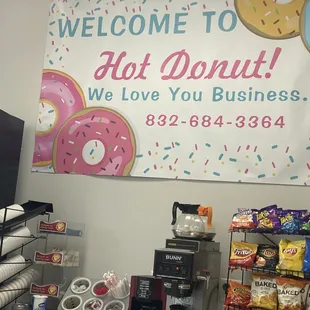 a sign in a donut shop