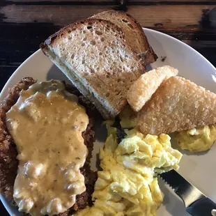 Country Fried Steak, Chorizo Sausage Gravy, Scrambled Eggs, Hash Browns, Wheat Toast