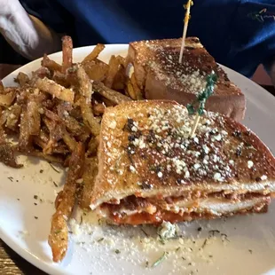 Chicken parmigiana with garlic fries