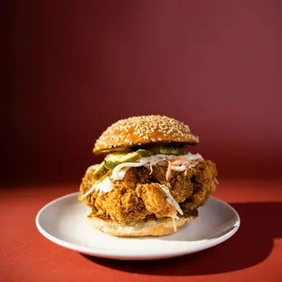 a fried chicken sandwich on a plate