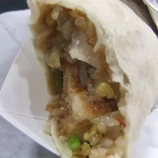 The Chino Burritto unwrapped and being enjoyed