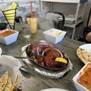 Chicken masala, tandoori, butter chicken, naan, mango lassi, basmati