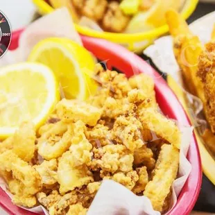 a basket of fried chicken and fries